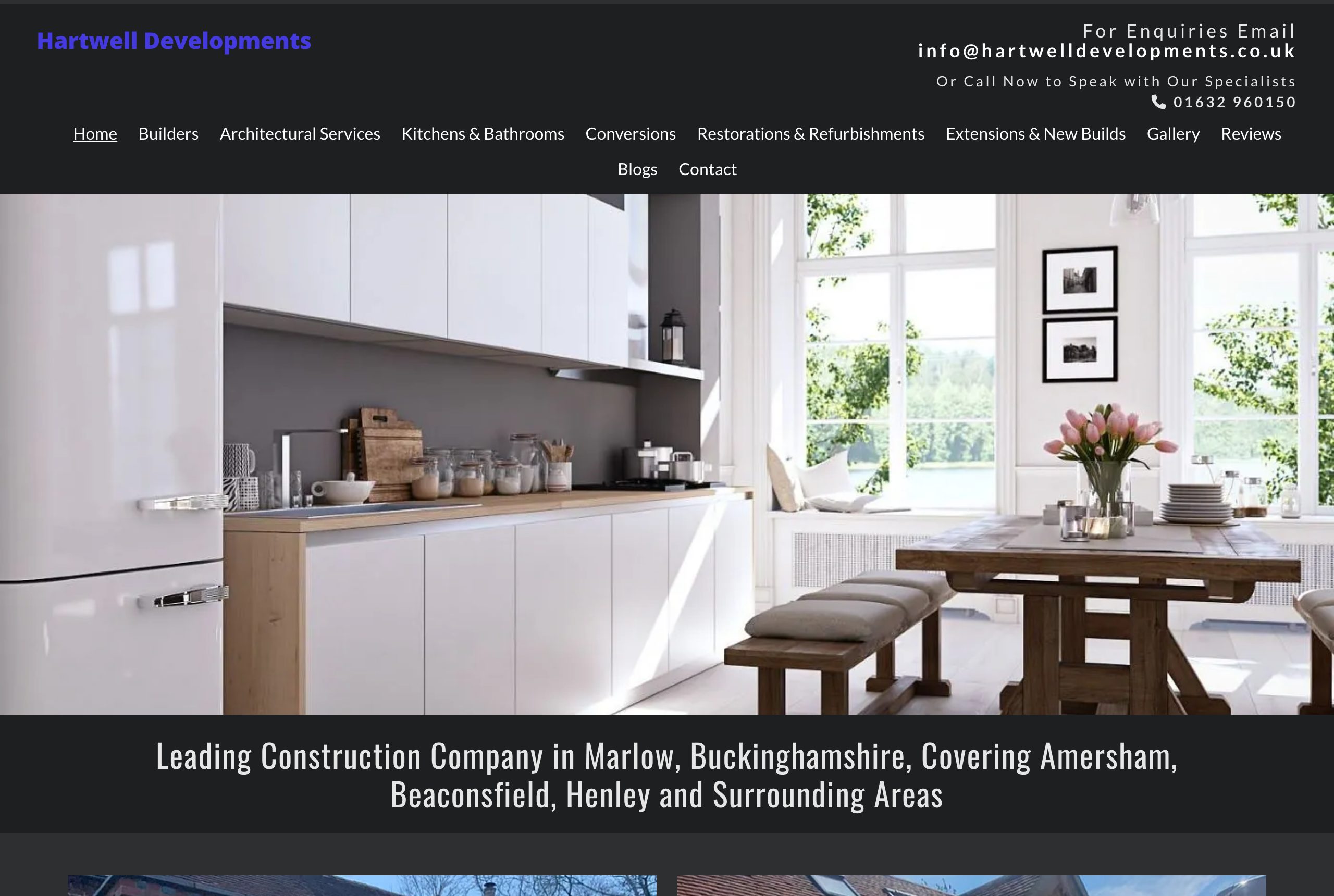 A dated construction website, blurred to protect the business